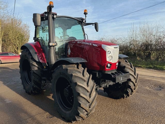 Red McCormick X6.413 tractor in the yard