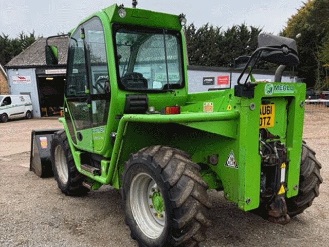 Green Merlo P34.7 Top telehandler parked outside the Cranworth workshop