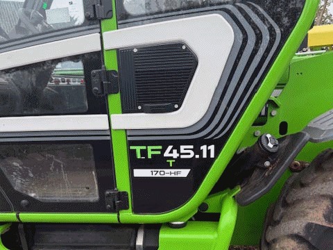 Merlo TF45.11 telehandler with a bucket on the yard